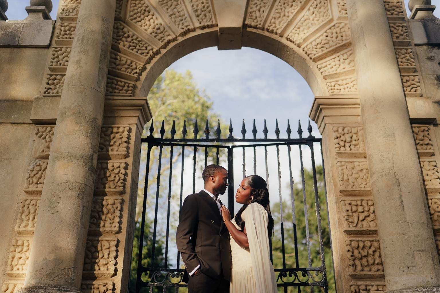 Davina and Peter sharing a moment at the gates